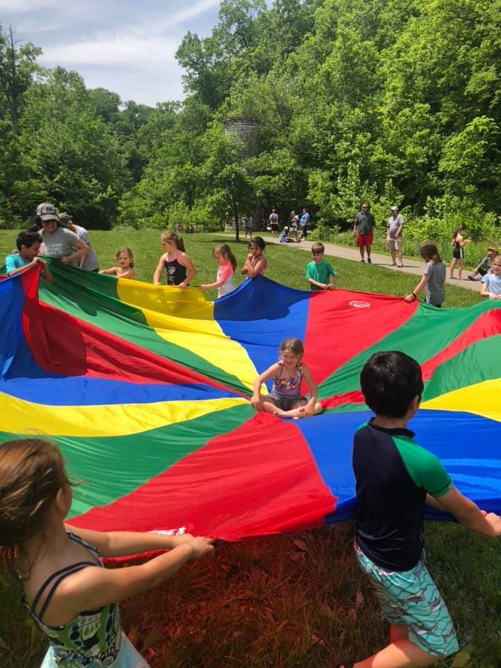 Kindergarten students with parachute