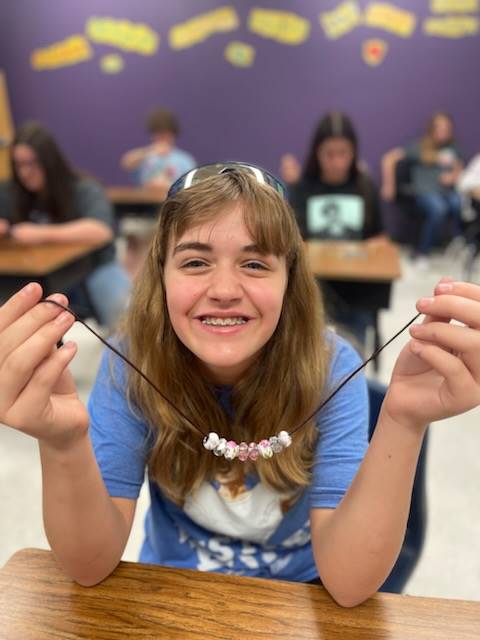 Student making jewelry