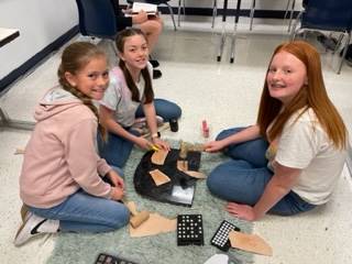 Students working on leather projects