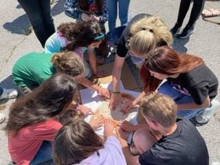 Students working on mosaic work