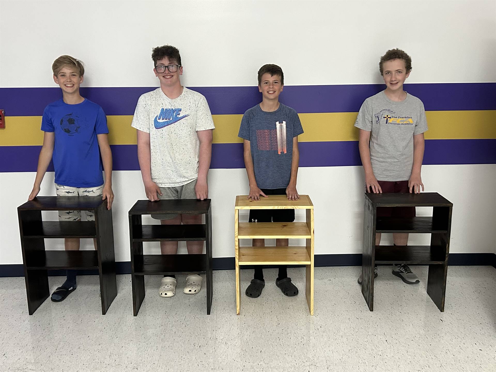 Students with their finished nightstands